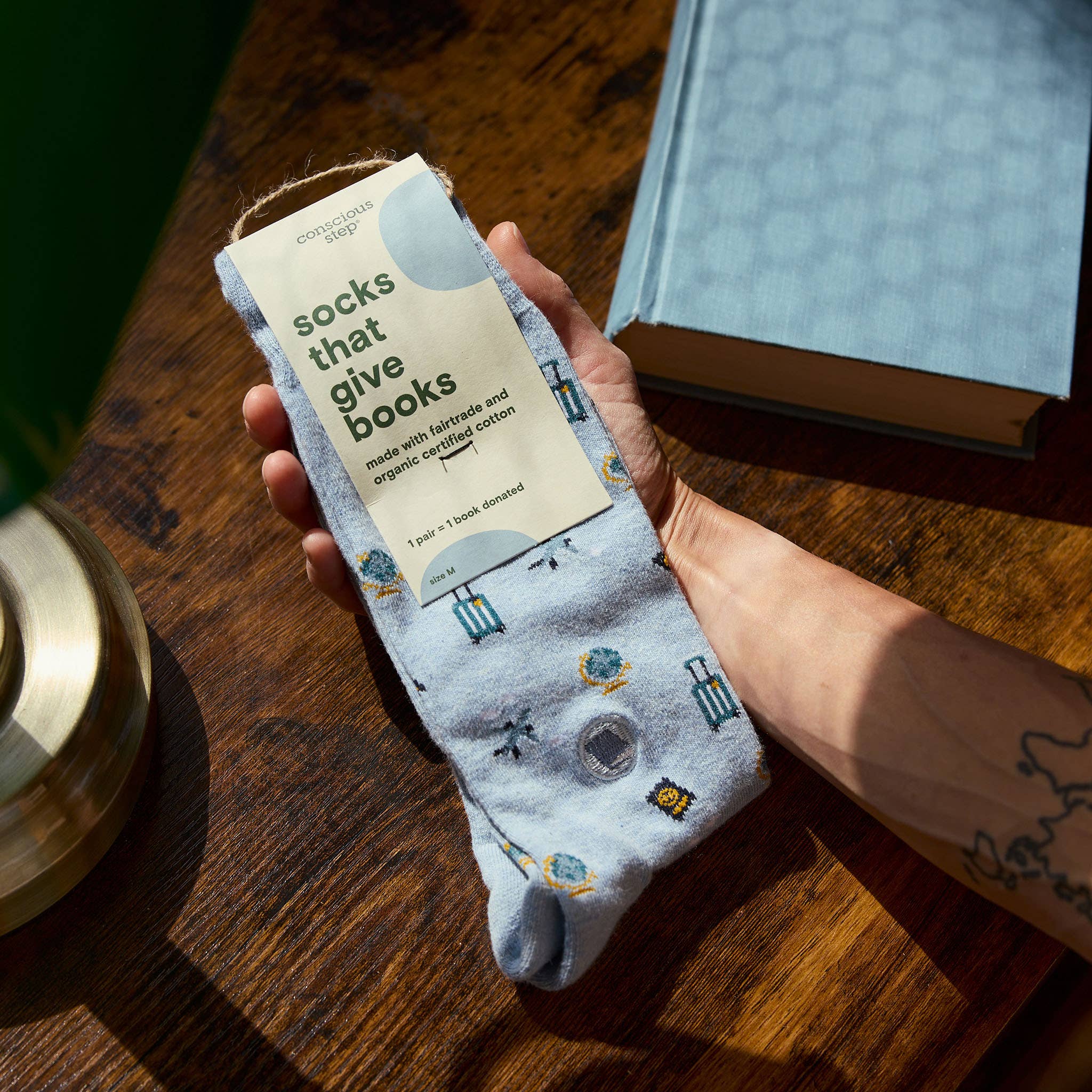 Socks that Give Books (Blue Travel) - Raymond's Hallmark